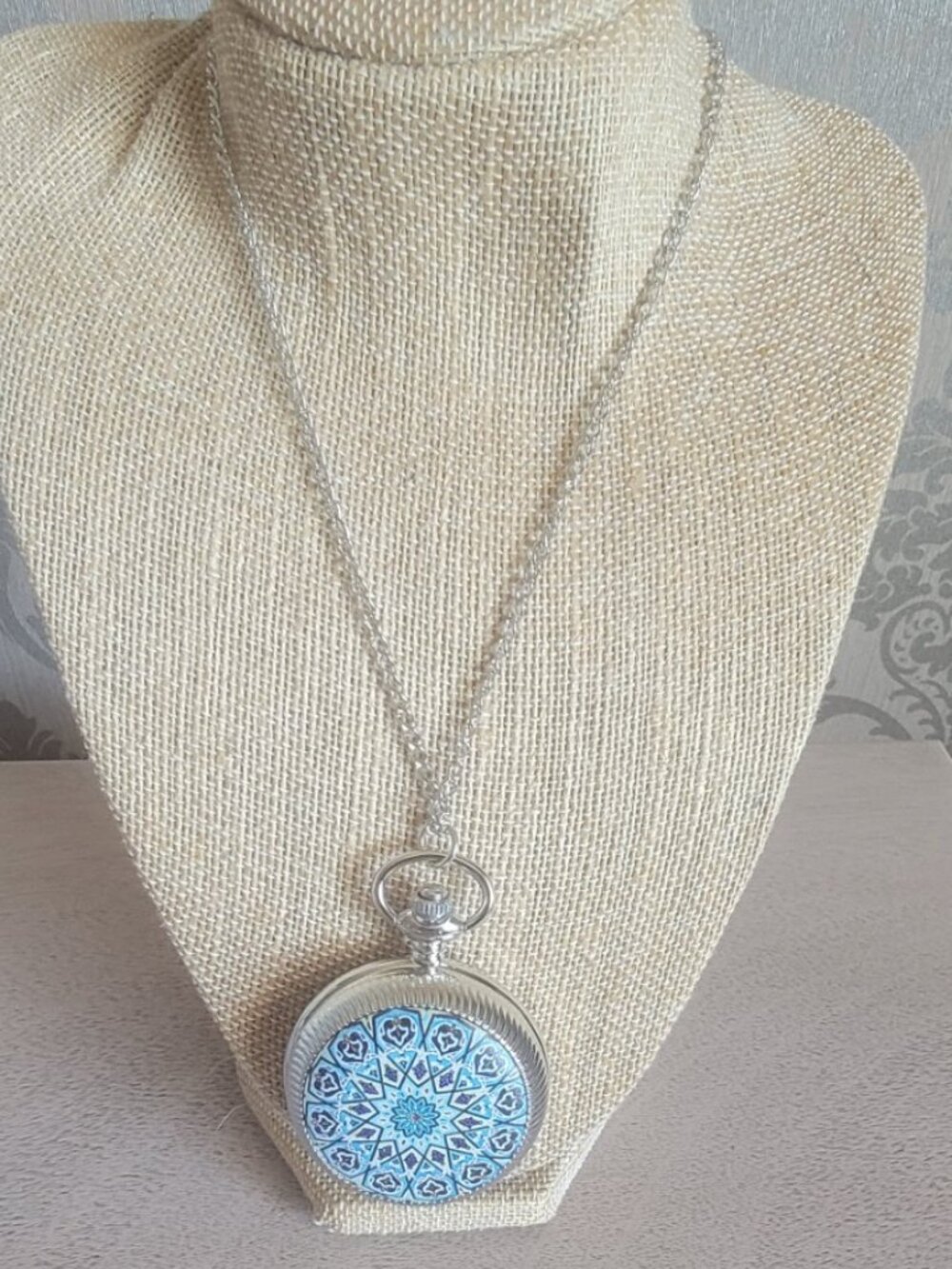 Strada Japanese Movement Black and Blue Flower Necklace Watch Pattern Rotating